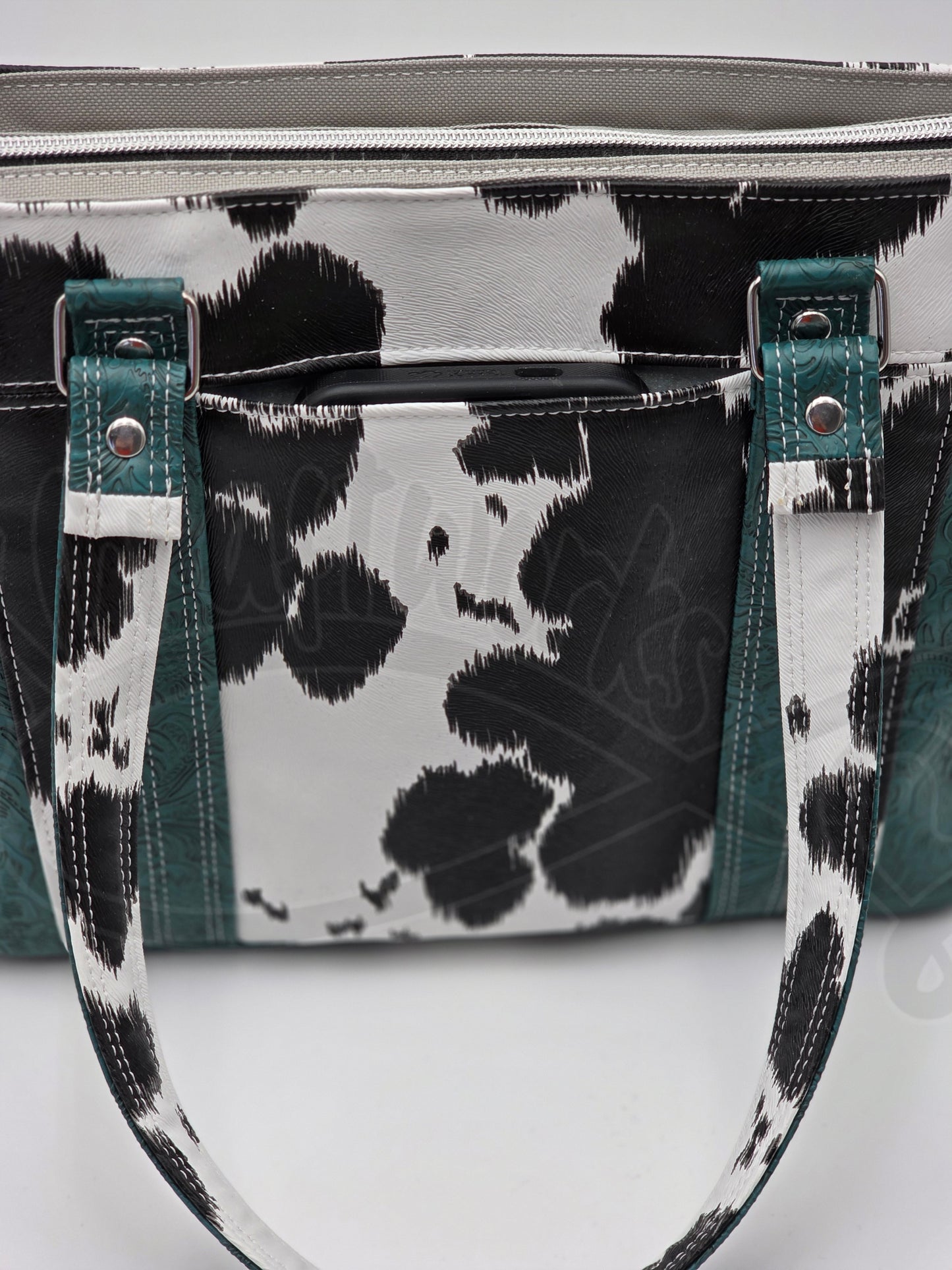 Mr. Heckles handbag- Teal/ black and white cow print crossbody handbag