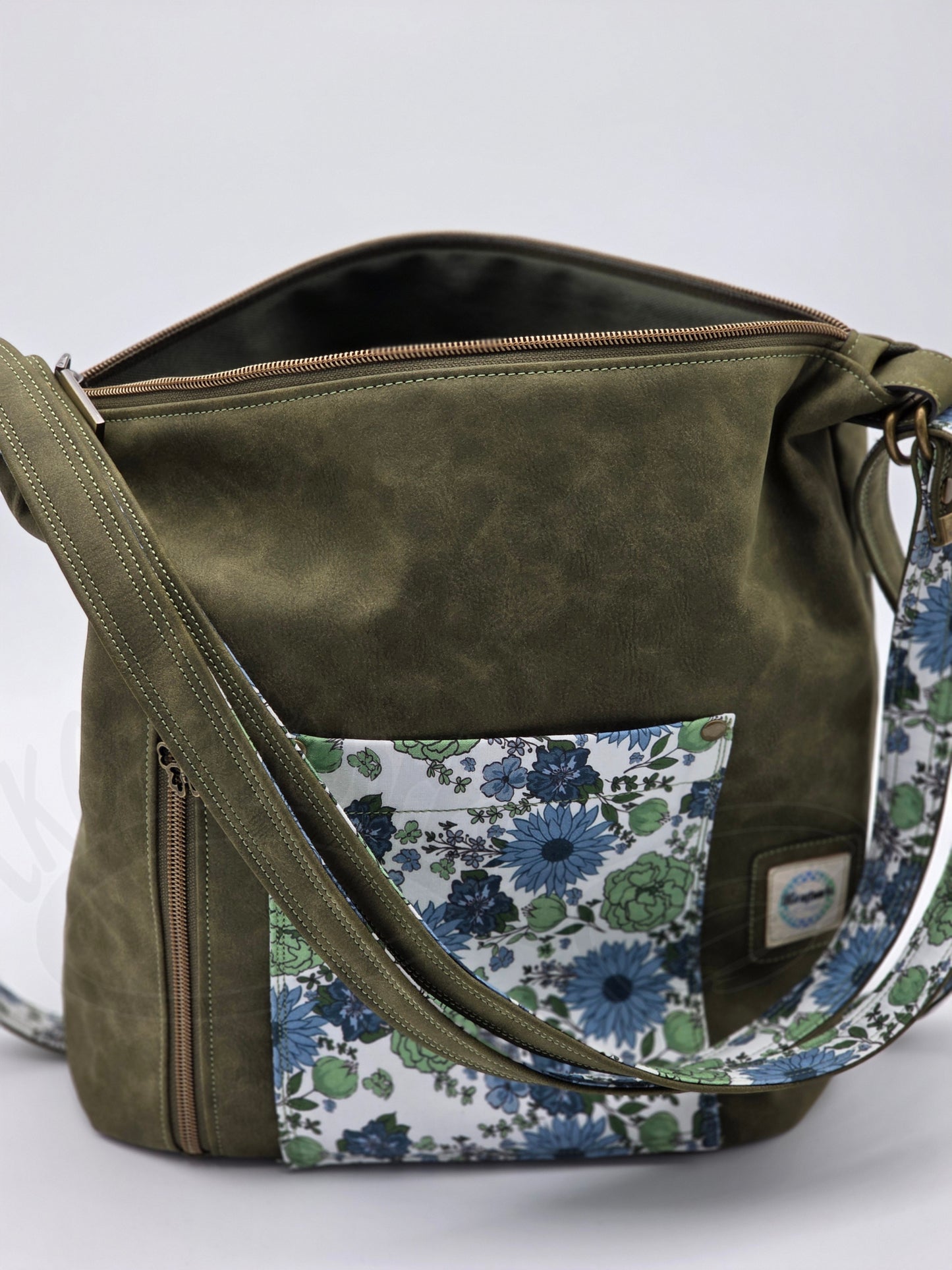Krystal Convertible Shoulder bag/backpack - Olive green and blue daisy