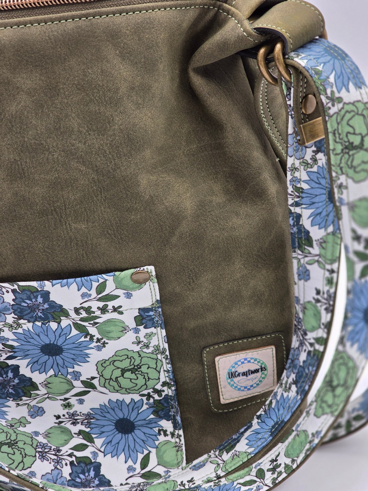 Krystal Convertible Shoulder bag/backpack - Olive green and blue daisy