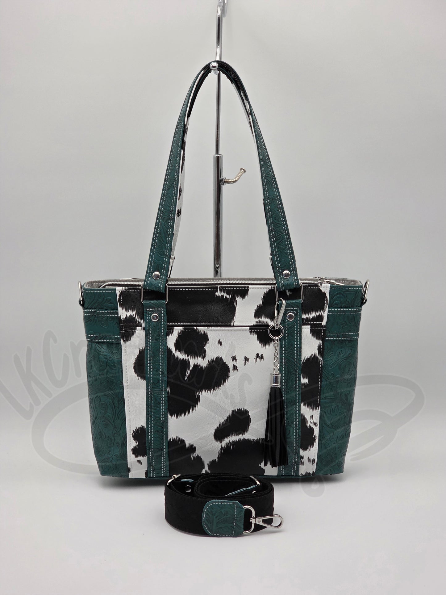 Mr. Heckles handbag- Teal/ black and white cow print crossbody handbag