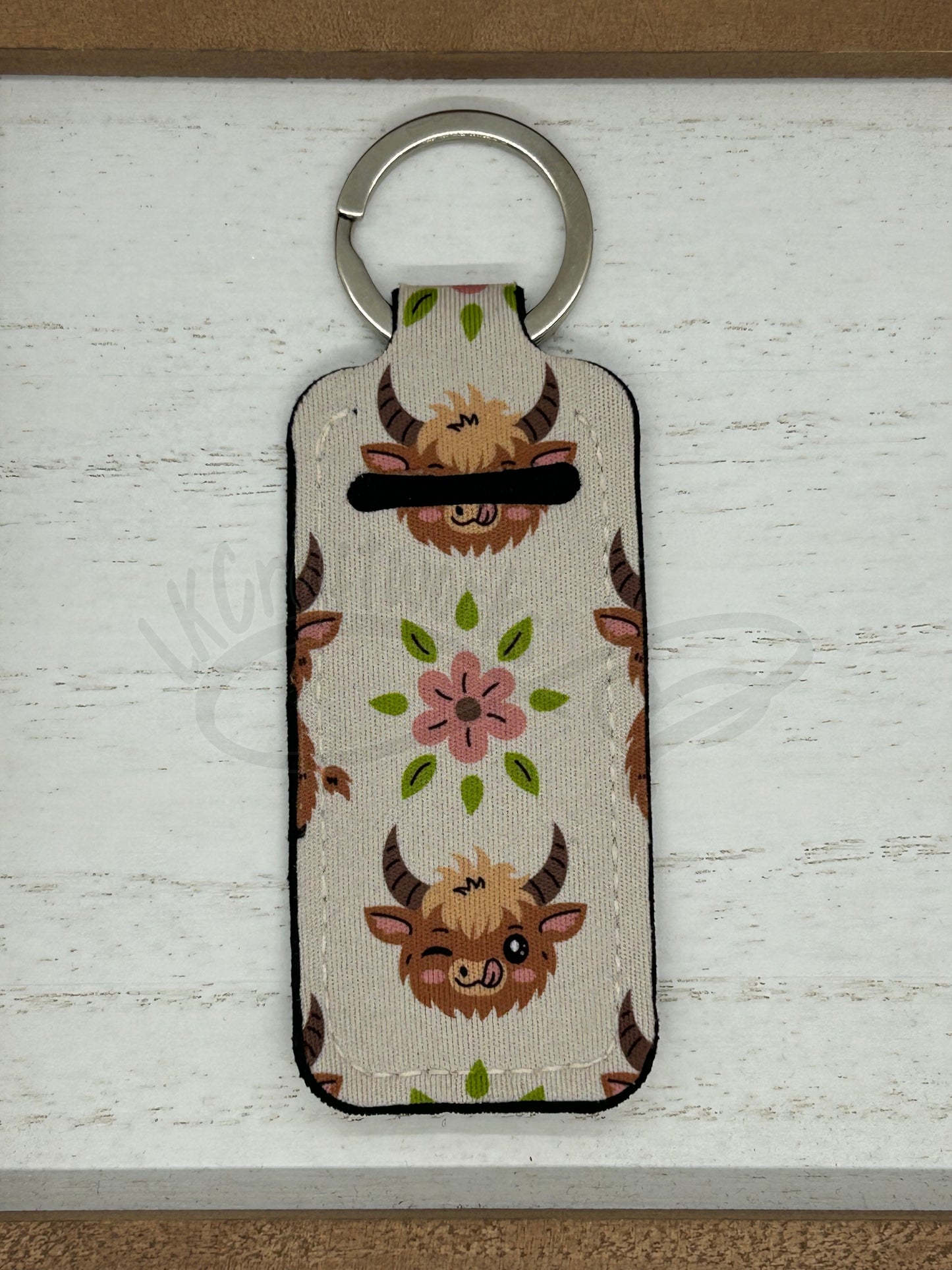 Keychain lip balm holder- Winking Highland cow